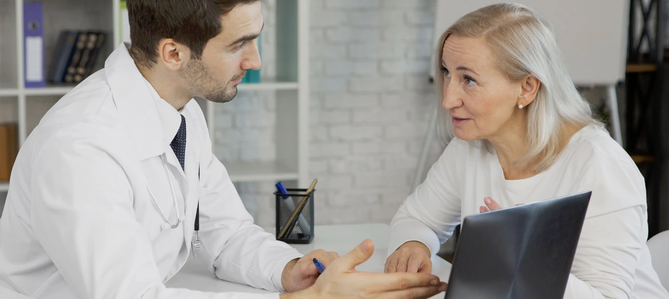 Doctor consulting with a patient for primary care
